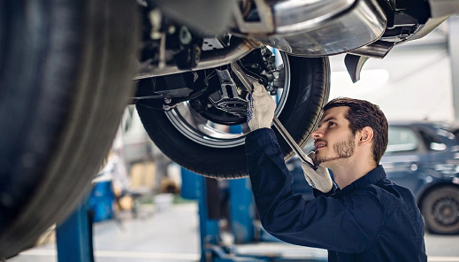 Mechanic working on car