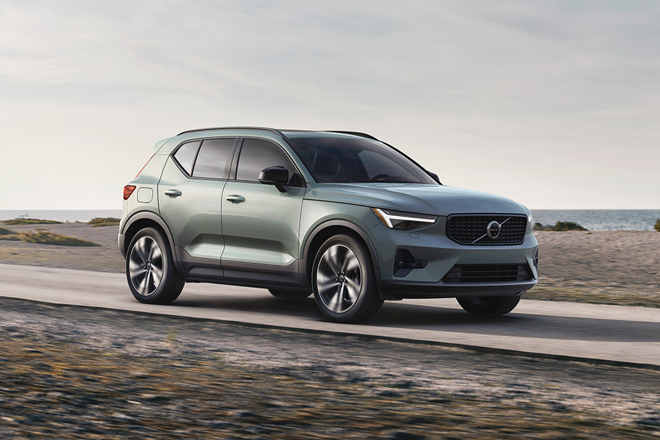 Volvo XC40 is driving down a road